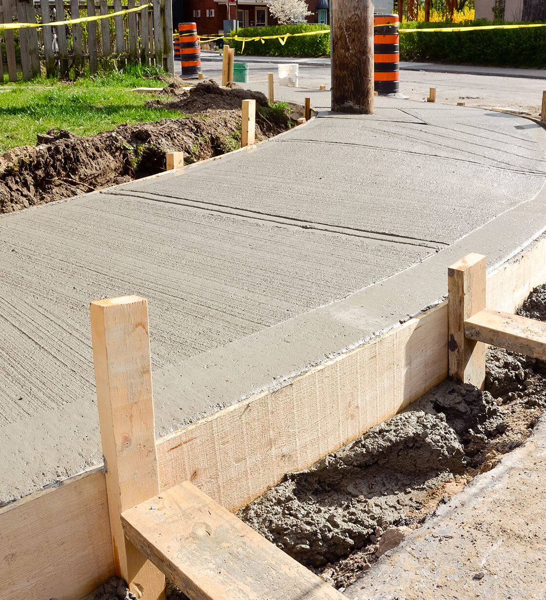 milton municipal contractor sidewalks and curbs